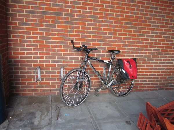 The photo for Poor cycle parking outside Family Bargains, Ashford.